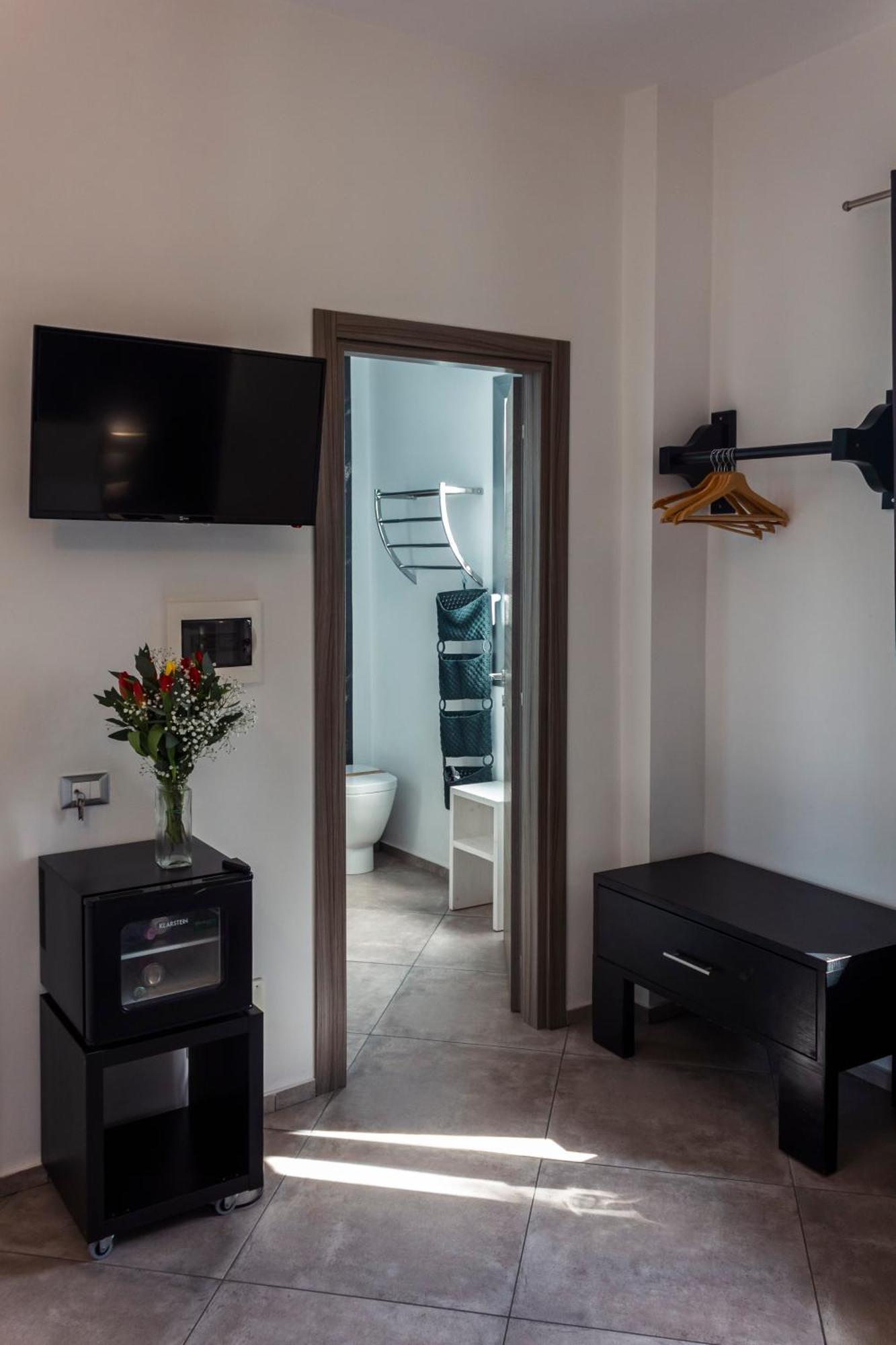 5 Elementi Acomodação com café da manhã Porto Empedocle Quarto foto